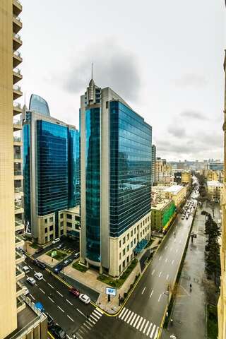 Апартаменты Cozy Ferrari Apartment with full amenities by Time Group Баку Апартаменты-27