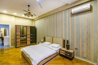 Апартаменты Cozy Ferrari Apartment with full amenities by Time Group Баку Апартаменты-35