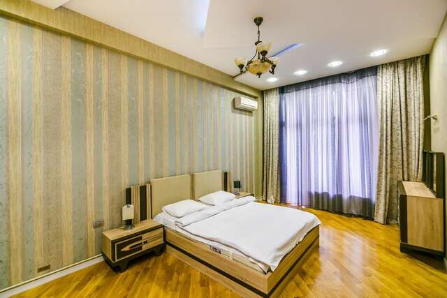 Апартаменты Cozy Ferrari Apartment with full amenities by Time Group Баку-14