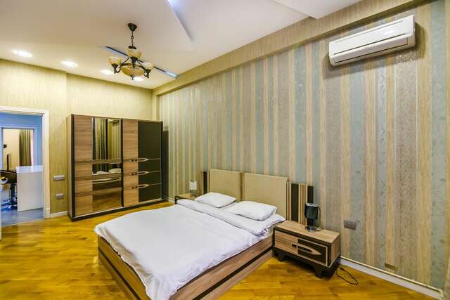 Апартаменты Cozy Ferrari Apartment with full amenities by Time Group Баку-15